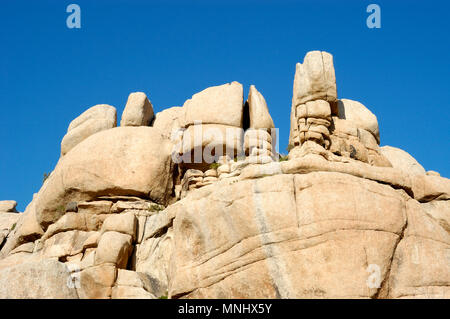 Monzogranite pila di rocce, Barker Dam nature trail. Big Horn Dam, Joshua Tree National Park, CA 040410 0720 Foto Stock