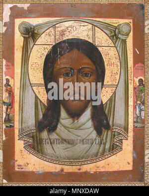 . Нерукотворенный Образъ Г(оспо)день. Обновившаяся 20 июля 1997 года старая икона Нерукотворного Спаса (Водяное, Змиевской район, Борисоглебский монастырь). Слева на полях изображён С(вя)тый Архис(тратиг) Михаил, справа - С(вя)тый Арх(анге)л Рафаил. 18 secolo (icona) / 1997 (обновление). Unk / foto - a Askalon (версия 1 - обновление, версия 2 - обработка) 1134 Spasner Foto Stock