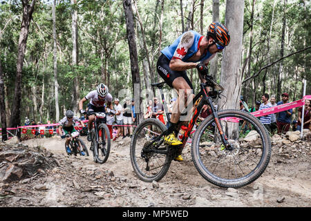 GOLD COAST, Australia - 12 aprile: Leandre BOUCHARD (possono) affronta le colline durante l'uomo Cross Country Mountain Bike il 12 aprile 2018 Foto Stock