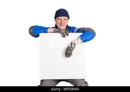 Gentile muratore tenendo un vuoto, segno bianco. Isolato su bianco Foto Stock