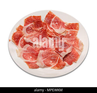 Dry cured fette di prosciutto sulla piastra e sfondo bianco Foto Stock