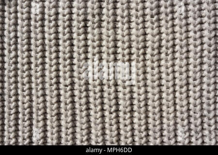 Close up dettaglio della maglia di lana di colore beige Foto Stock