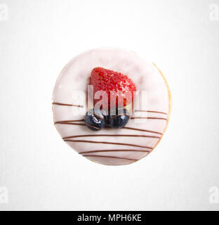 Ciambella o una gustosa ciambella su uno sfondo Foto Stock