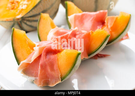 Melone Melone con prosciutto, un tradizionale spagnolo e italiano antipasto Foto Stock