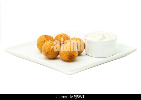 Palline di formaggio e salsa maionese su un quadrato bianco piastra Foto Stock