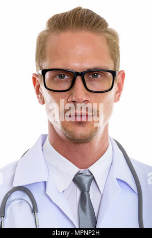 Volto del giovane uomo bello medico indossando occhiali da vista Foto Stock