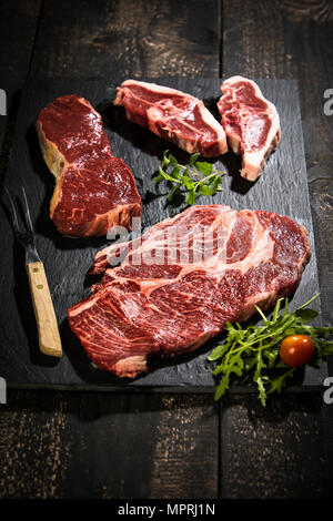 La carne cruda, roast beef , american chuck eye bistecca e Lamb Chop Foto Stock