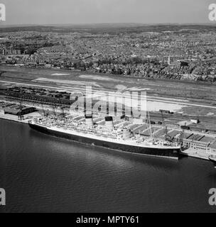 RMS 'Mauretania' alla New Docks (Western Docks), Southampton, Hampshire, 1949. Artista: Aerofilms. Foto Stock