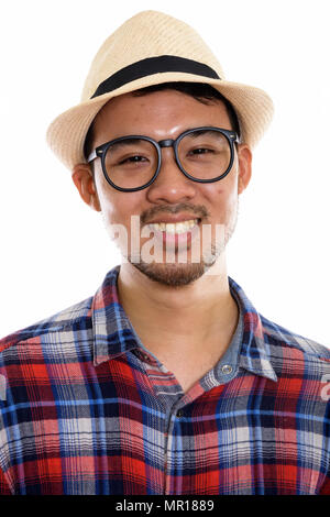 Volto di giovani asiatici felice uomo sorridente indossando occhiali di un Foto Stock