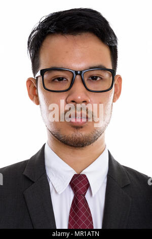 Volto del giovane imprenditore asiatici indossando occhiali da vista Foto Stock