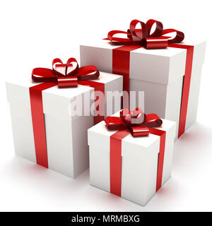 Confezioni regalo, set di tre presenta, presenta avvolto con nastro rosso Foto Stock
