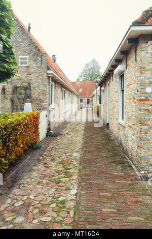 Le piccole case in Bourtange, olandese un villaggio fortificato nella provincia di Groninga nel nord dei Paesi Bassi Foto Stock