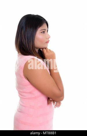 Vista di profilo del giovane persiano grassa ragazza adolescente pensando isolato Foto Stock