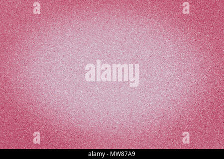 Texture di granito di colore rosso con piccoli punti con la vignettatura, uso di sfondo. Foto Stock