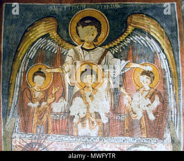. Inglese: affresco dell arcangelo Michele proteggere Hananiah, Mishael e Azaria nel fuoco. Chiesa Oscura, Cappadocia. Русский: Три отрока в пещи огненной. tra il secolo XII e il XIII secolo. Anonimo; Foto di utente:Shakko, Gennaio 2008 414 Michael capp Foto Stock