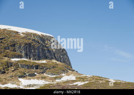 La montagna Ulvehaugnosi con neve in primavera, Laerdal Hemsedal Norvegia. Foto Stock