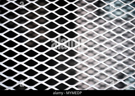 Sullo sfondo di un metallo con ripetitivo patten Foto Stock