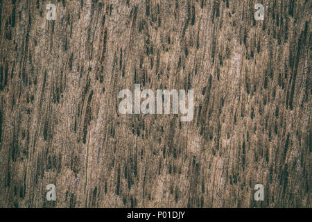 Vintage superficie tavolo di legno rustico e texture di grano dello sfondo. Close up rustico scuro muro fatto di legno vecchio tavolo plance texture. Rustico in legno marrone Foto Stock