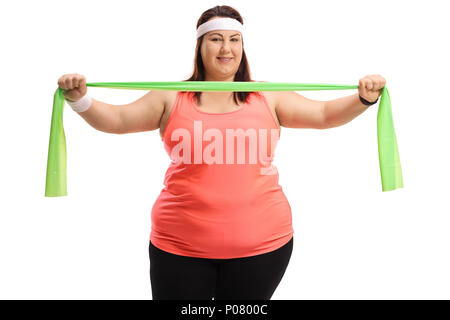 Il sovrappeso donna che lavorano fuori con un nastro di gomma isolati su sfondo bianco Foto Stock