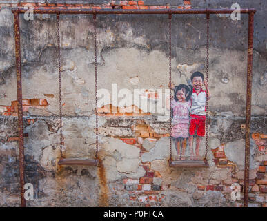 Georgetown, Malesia - la principale isola della Malesia, Penang è famosa per la sua arte di strada. Qui in particolare di uno dei numerosi dipinti di Georgetown Foto Stock