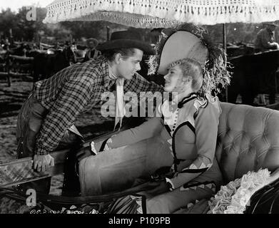 Pellicola originale titolo: IL DESPERADOES. Titolo inglese: il DESPERADOES. Regista: CHARLES VIDOR. Anno: 1943. Stelle: CLAIRE TREVOR; Glenn Ford. Credito: Columbia Pictures / Album Foto Stock