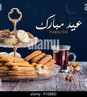 Felice Eid ElFitr biscotti dolci, biglietto di auguri Foto Stock