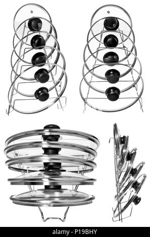 Cucina appendiabiti con coperchi in vetro per cucinare pentole. Appendiabiti adatto per appendere su armadi, cucina rotaie. Realizzato in alluminio, argento, filo isolato su un Foto Stock