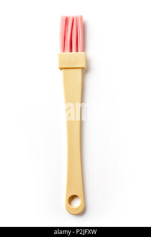 Giallo e rosa spazzola di pasticceria isolati su sfondo bianco, dal di sopra Foto Stock