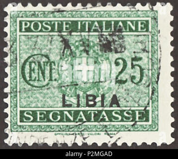 . Timbro dell'Italian-Libya; 1934; affrancatura dovuta a timbro (Italiano: 'Segnatasse') nel disegno di una centrale di Savoia stemma in piedi ovale con due laterali "Fascio' come ornamento; spese di affrancatura dovuta timbro dell Italia dal 1943 con sovrastampa "LIBIA"; con timbro postale timbro: Michel: No. P15 (= Italia n. P27 da 1934 con sovrastampa); & Yvert Tellier: No. TT15; Scott: No. J15 Colore: verde filigrana: Italia n. 1 (crown) Valore nominale: 25 Cent. (Centesimi) affrancatura validità: dal 12 maggio 1934 fino al febbraio 1943 Timbro dimensioni immagine (area stampata senza nome sotto la linea): 21,0 x 17,0 mm . 12 maggio 1934. Poste del Regno d' Foto Stock