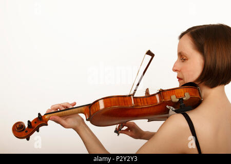 Col legno su un violino Foto Stock