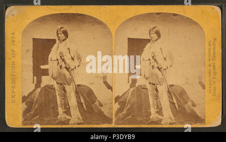 269 Shee-zah-nan-tan, Jicarilla Apache brave in costume caratteristico, New Mexico settentrionale, da O'Sullivan, Timothy H., 1840-1882 4 Foto Stock