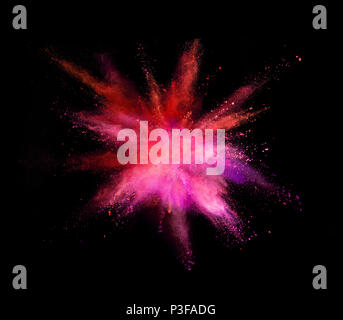 Esplosione di polvere colorata isolati su sfondo nero. Abstract background in alta risoluzione. Foto Stock