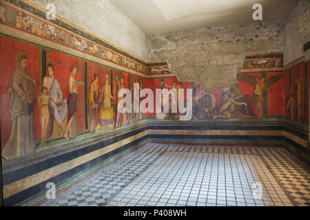 Il dionisiaco misteri (Bacchian misteri) rappresentata in età romana affreschi nel triclinio (Romano la sala da pranzo di Villa dei Misteri (Villa dei Misteri) nel sito archeologico di Pompei) vicino a Napoli, campania, Italy. Rito di iniziazione dal misterioso culto di Dioniso (Bacco) è probabilmente rappresentata negli affreschi. Foto Stock