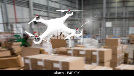 Drone battenti dal magazzino con consegna le cassette dei pacchi Foto Stock