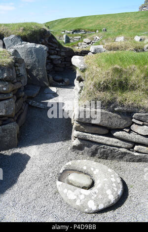 Età del Bronzo Mola a Jarlshof, Isole Shetland. Foto Stock