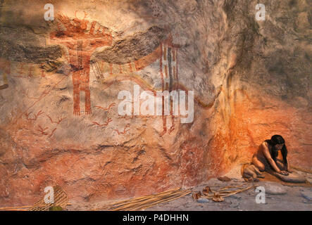 Famiglia indiana vivente al rock shelter abitazione, display al centro visitatori di Seminole Canyon State Park e il sito storico vicino Comstock, Texas, Stati Uniti d'America Foto Stock