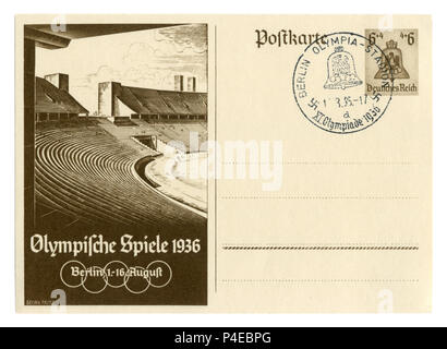 German Historical cartolina postale: XI Giochi Olimpici Estivi 1936 a Berlino, lo stadio Olimpico. La campana è un simbolo dei giochi, cancellazione speciale, Foto Stock