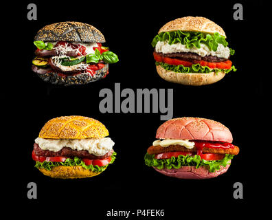 Collage di hamburger con ciambelle colorate e diversi riempimenti su sfondo nero Foto Stock