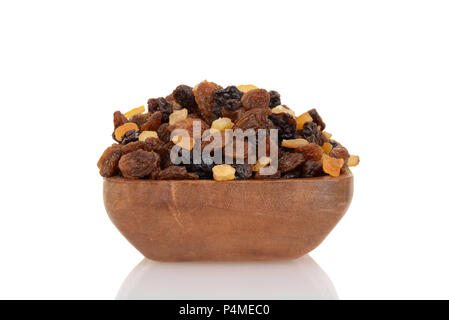 Closeup uva secca di Corinto e uva sultanina con frutta candita in ciotola di legno Foto Stock