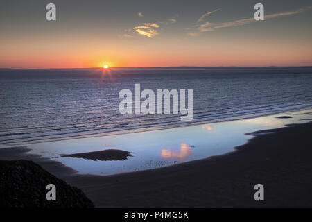 Rhossili Solstizio tramonto 2018 Foto Stock