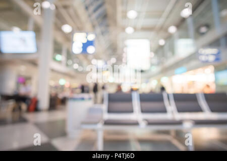 Immagine sfocata bokeh di posti a sedere in aeroporto. Foto Stock