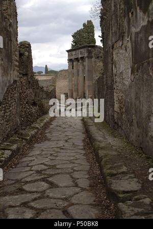 L'Italia. Pompei. Strada di ciottoli. Foto Stock