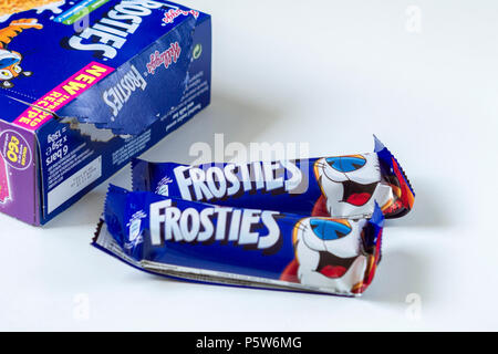 Frosties barrette di cereali nei loro involucri dalla casella Foto Stock