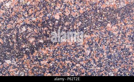 Texture in granito con base grigia e macchie nere. sfondo, geologici Foto Stock