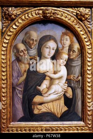 Pietro Orioli (1458-1496) la Vergine con Bambino e quattro santi. Tempera e oro su pannello. Orioli era rinomato per la sua pietà come pure per la sua arte. Dipinse altamente raffinati immagini sacre. Questo design ricorda i precedenti tradizioni in arte senese Foto Stock