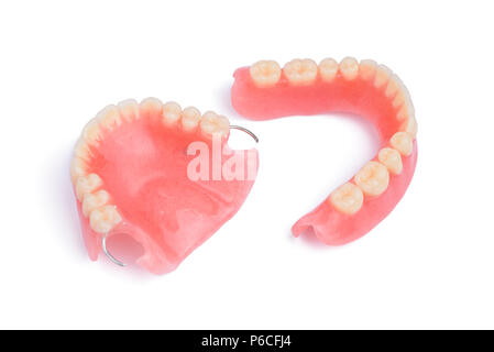 Set completo di denti finti. Isolato su sfondo bianco Foto Stock