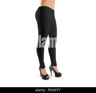 Donna di usura in bianco nero leggings mockup, isolata, percorso di clipping. Le donne in chiaro leggins modello. Pantaloni tessuto design presentazione. Sport pantaloons stretch collant modello indossa. Gambe Slim in capi di vestiario. Foto Stock