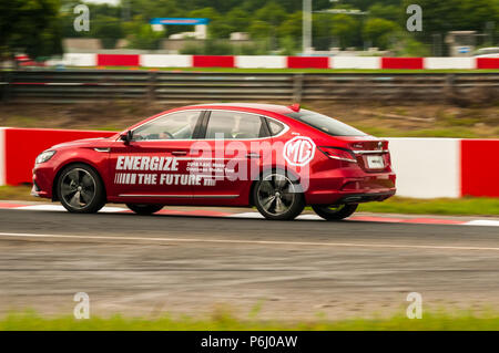 La nuova MG 6 da SAIC essendo pilotato sulla gara Tianma circuito di Shanghai in corrispondenza di un supporto d'oltremare evento. Foto Stock