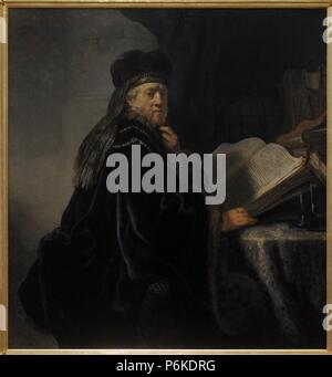 Rembrandt van Rijn (1606-1669). Uno studioso nel suo studio o uno studioso seduti ad una scrivania, 1634. Lo studioso, assorbito nei suoi pensieri, diventa una domanda il colpo d'occhio di chi guarda. Olio su tela. Galleria Nazionale. Praga. Repubblica ceca. Foto Stock