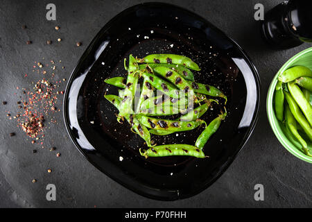 Grigliata di piselli verdi Foto Stock